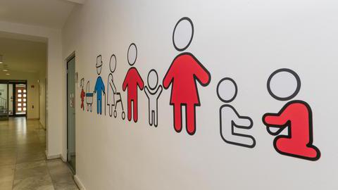 Das Familienbüro in Bochum - Dekoratives Wandbild mit Piktogrammen zum Thema "Familie"
