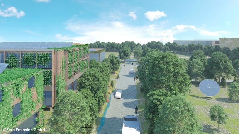Das Modell des geplanten klimaangepassten Gewerbegebiets zeigt eine Allee mit Bäumen, rechts eine Wiese mit Solarflächen und auf der linken Seite ein Gebäude mit Solarflächen und bepflanzten Dächern.