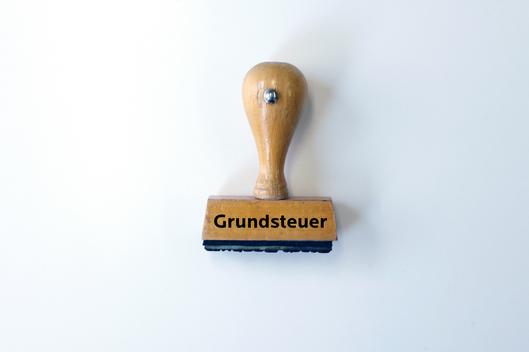 Stempel mit Schriftzug Grundsteuer
