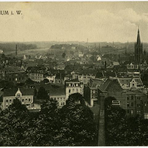 Das historische Bild zeigt Häuser aus einer Luftansicht.