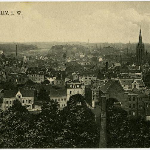 Das historische Bild zeigt Häuser aus einer Luftansicht.